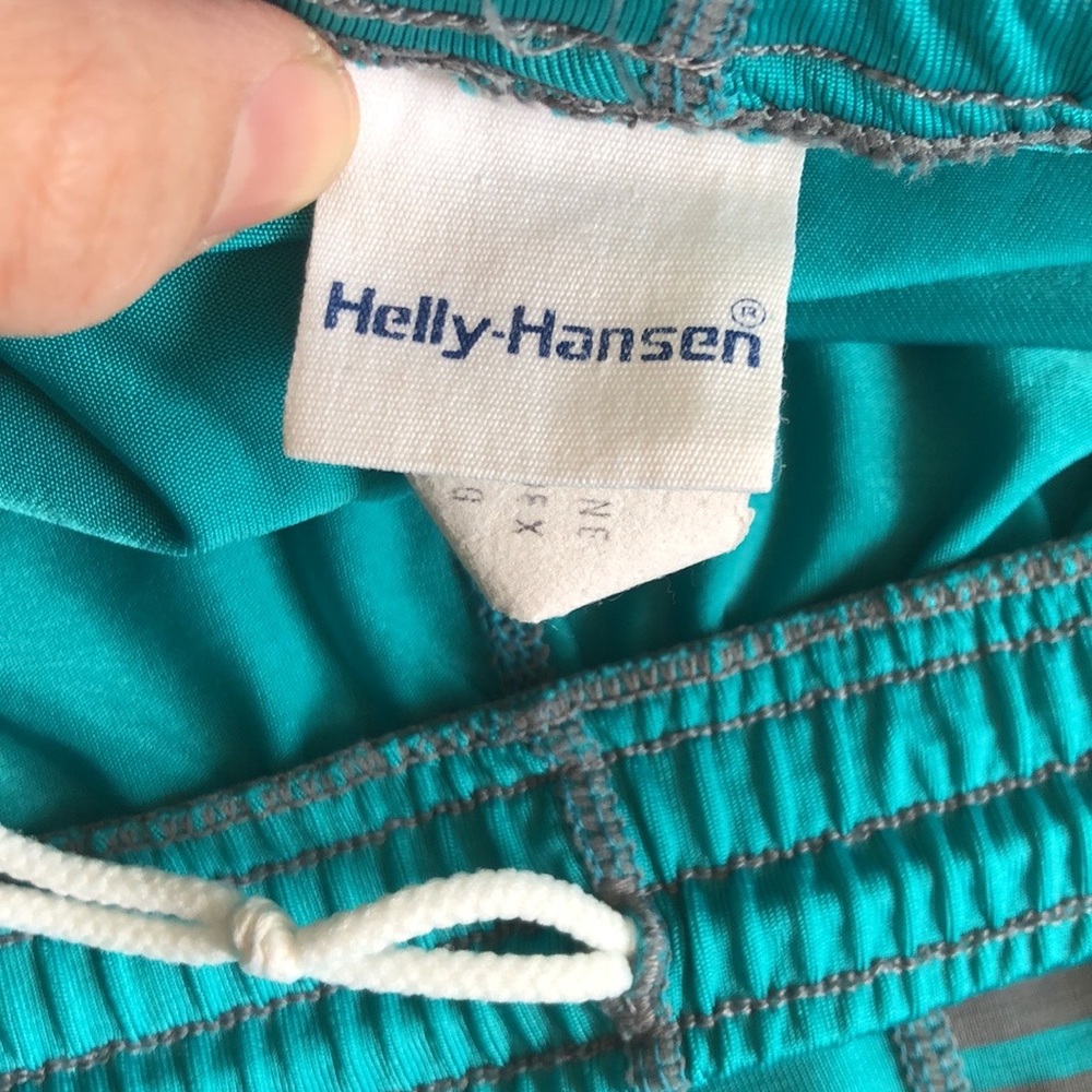 Vintage turquoise Helly-Hansen stirrup high waisted leggings.